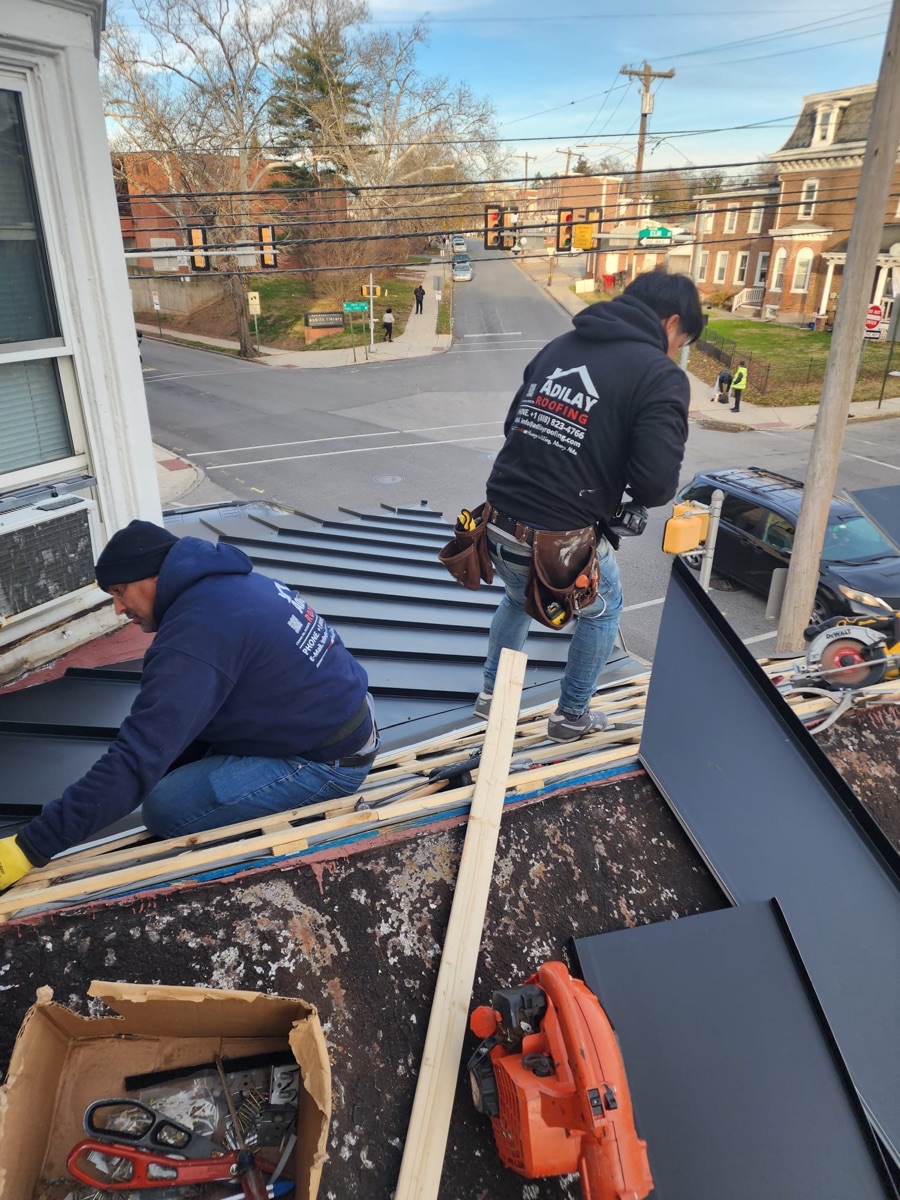 Close-up of professional standing seam metal roof installation by Adilay Roofing in Philadelphia